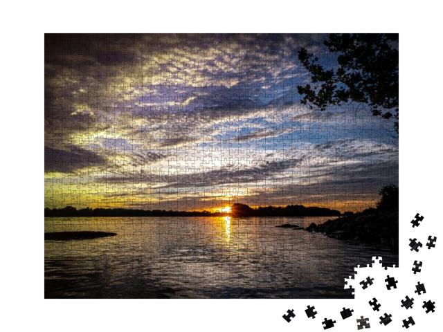 A Beautiful View of the Sun on the Horizon Next to the Mi... Jigsaw Puzzle with 1000 pieces