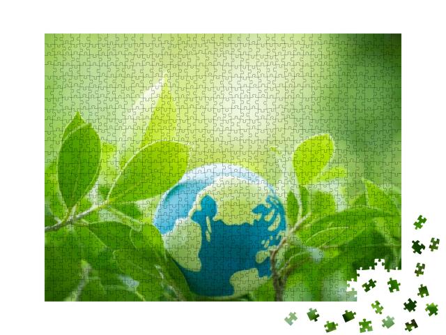 Nature of Green Leaf with World Globe in Garden At... Jigsaw Puzzle with 1000 pieces
