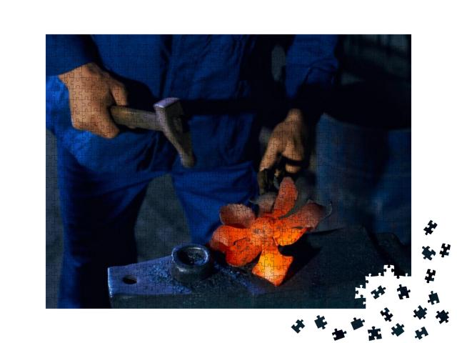 Close Up of Craftsman in Blue Overalls Forging Molten Met... Jigsaw Puzzle with 1000 pieces