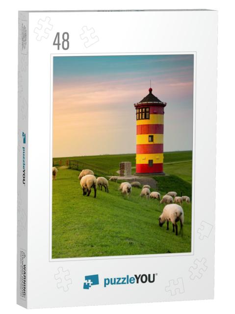 A Beautiful Lighthouse on the East Frisian Coast... Jigsaw Puzzle with 48 pieces
