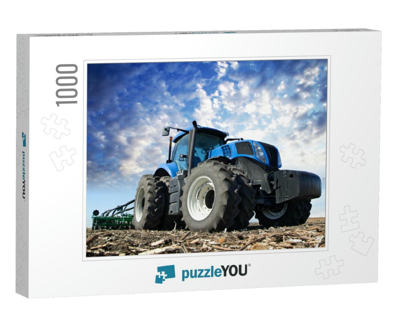 The Tractor Wheels on the Huge Field, a Farmer Riding a T... Jigsaw Puzzle with 1000 pieces