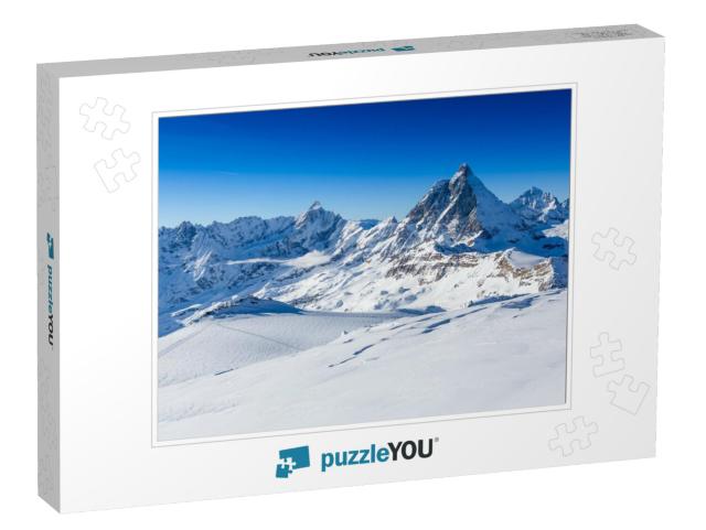 Ski Slope & Snow Covered Winter Mountains. Matterhorn is... Jigsaw Puzzle