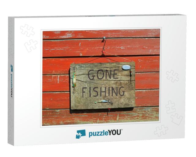 Gone Fishing Sign Written on a Wooden Plaque Hanging on a... Jigsaw Puzzle