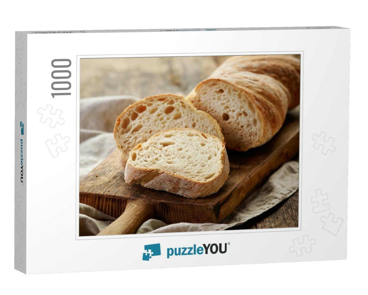 Freshly Baked Ciabatta Bread on Wooden Cutting Board... Jigsaw Puzzle with 1000 pieces
