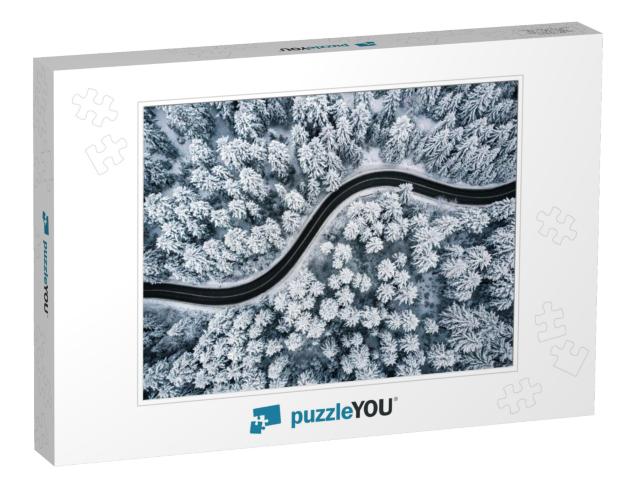 Curvy Windy Road in Snow Covered Forest, Top Down Aerial... Jigsaw Puzzle