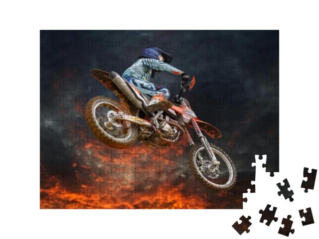 Jumping Motocross Rider with Firestorm in the Background... Jigsaw Puzzle with 200 pieces