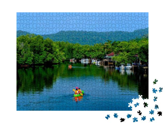A Surfer is Kayaking in a Beautiful Stream... Jigsaw Puzzle with 1000 pieces