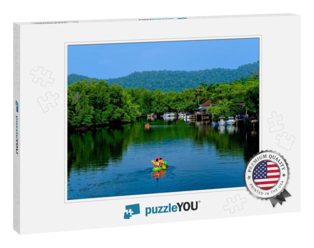 A Surfer is Kayaking in a Beautiful Stream... Jigsaw Puzzle