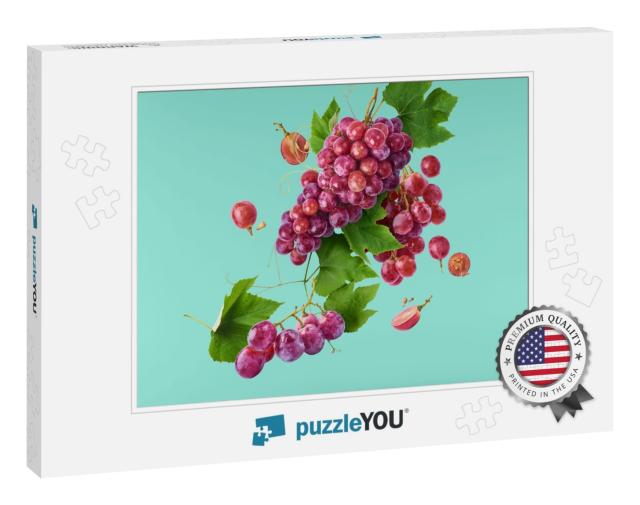 Fresh Ripe Grapes with Leaves Falling in the Air Isolated... Jigsaw Puzzle