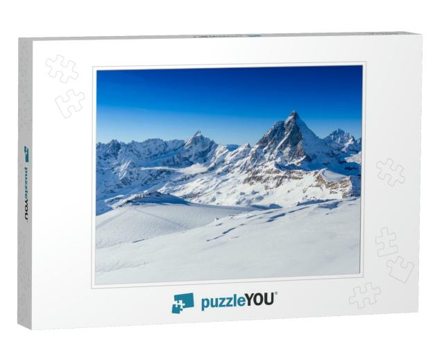 Ski Slope & Snow Covered Winter Mountains. Matterhorn is... Jigsaw Puzzle