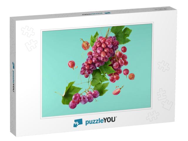 Fresh Ripe Grapes with Leaves Falling in the Air Isolated... Jigsaw Puzzle