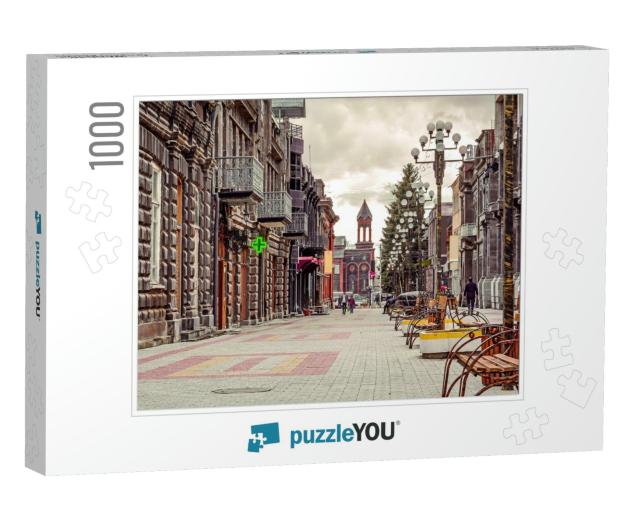 Scenic Old Paving Street with Church on the Background in... Jigsaw Puzzle with 1000 pieces