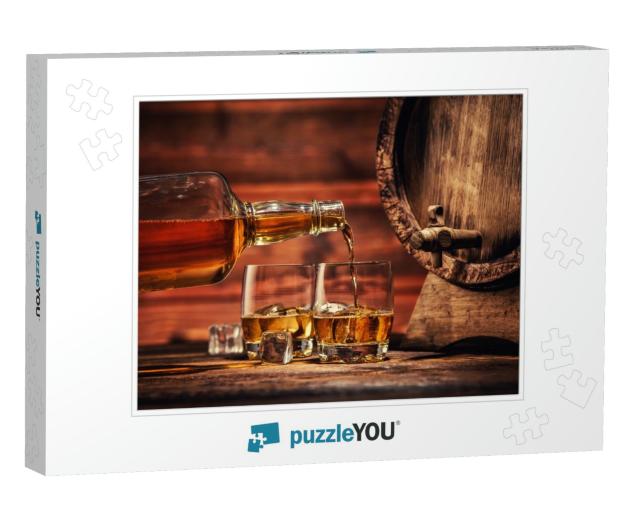 Pouring Whiskey from Bottle to Two Glasses with Ice Cubes... Jigsaw Puzzle