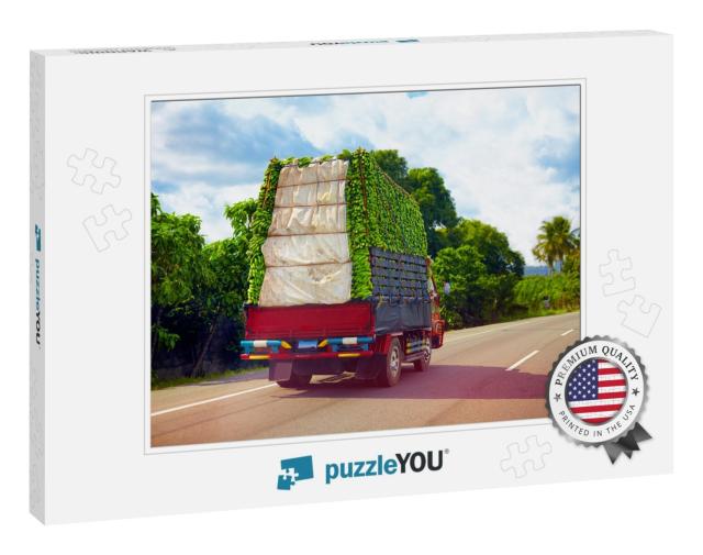 A Truck Carrying a Load of Bananas, Driving Through Domin... Jigsaw Puzzle