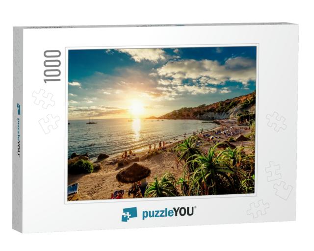 Cala Dhort Beach At Sunset. People Sunbathing, Have a Par... Jigsaw Puzzle with 1000 pieces