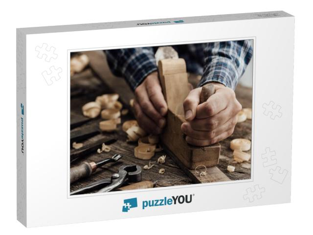 Carpenter Working in His Workshop, He is Smoothing a Wood... Jigsaw Puzzle