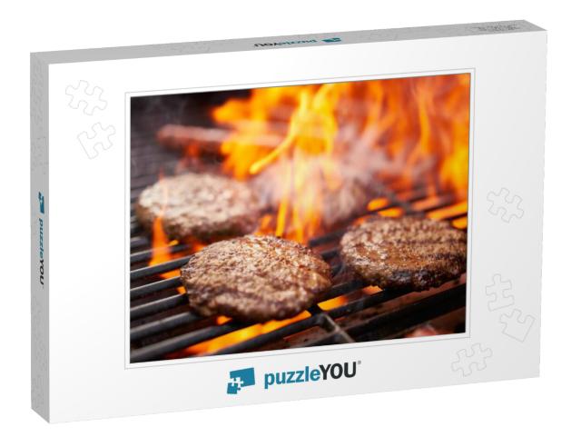 hamburgers and hot dogs cooking on grill with flam Jigsaw Puzzle