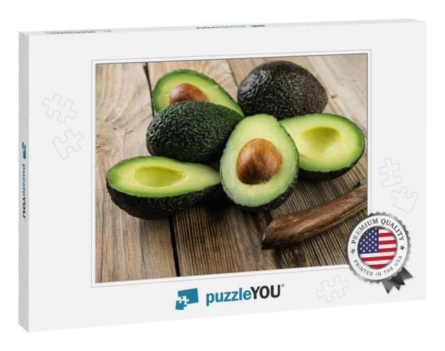 Fresh Sliced Avocado on Wooden Table. Vegetarian Food Con... Jigsaw Puzzle