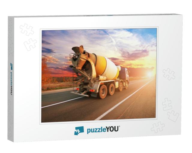Blue Concrete Mixer Truck on the Countryside Road with Tr... Jigsaw Puzzle