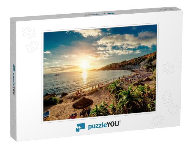 Cala Dhort Beach At Sunset. People Sunbathing, Have a Par... Jigsaw Puzzle