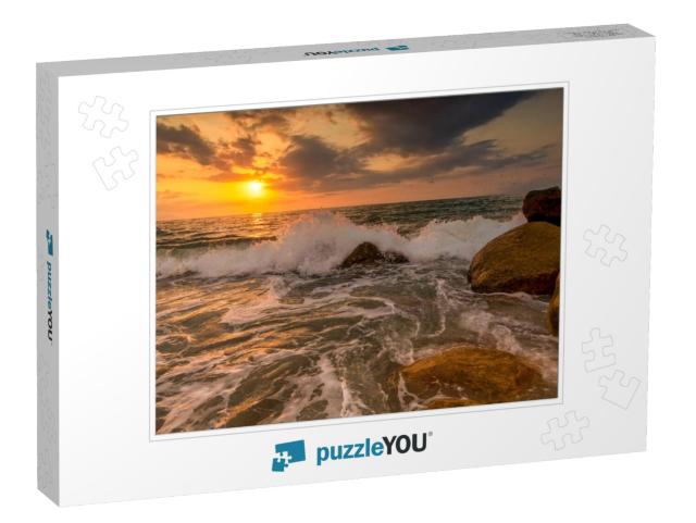 A Sunset Ocean Wave is Breaking on the Sea Shore with the... Jigsaw Puzzle