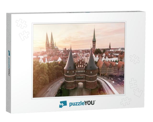The Holsten Gate in the Hanseatic City of Lubeck At Sunri... Jigsaw Puzzle