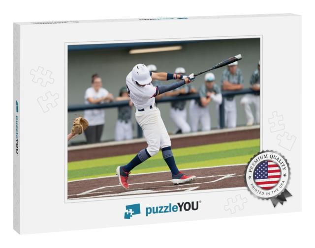 Young Boy Swinging the Bat for a Hit in Baseball Game... Jigsaw Puzzle