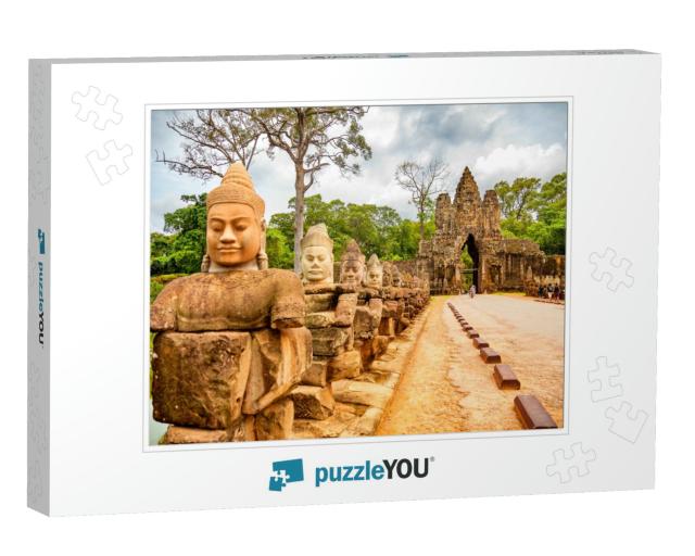 Row of Sculptures in the South Gate of Angkor Thom Comple... Jigsaw Puzzle