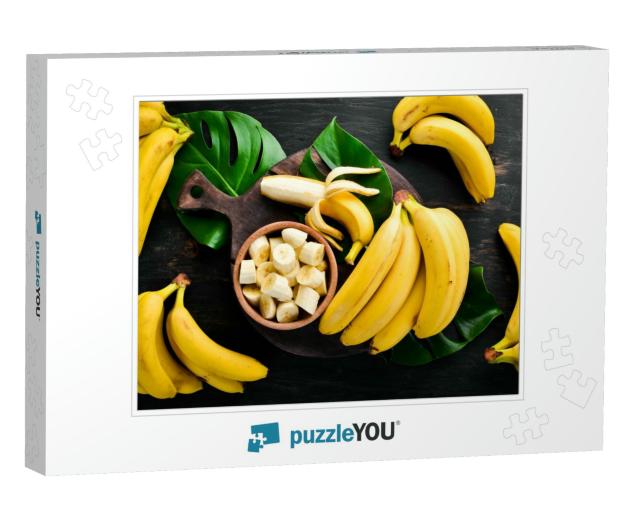Bananas on a Black Wooden Surface. Tropical Fruits. Top V... Jigsaw Puzzle