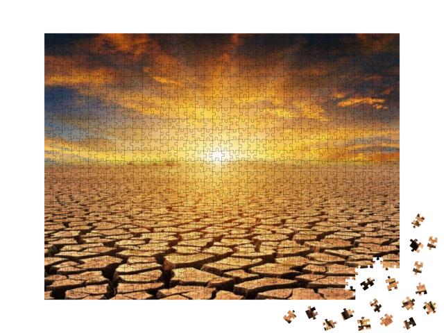 Orange Cloudy Sunset Over Cracked Desert... Jigsaw Puzzle with 1000 pieces