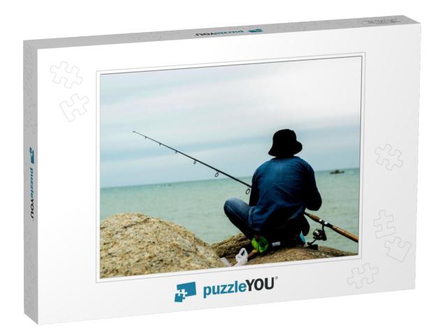 Man Fishing on the Beach, Fishing, Hunting for Fish. Fish... Jigsaw Puzzle