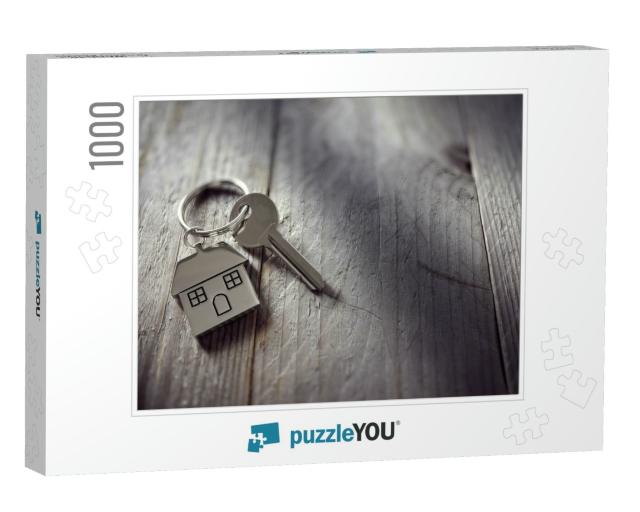 House Key on a House Shaped Keychain Resting on Wo... Jigsaw Puzzle with 1000 pieces