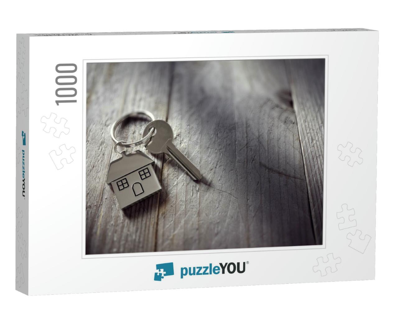 House Key on a House Shaped Keychain Resting on Wo... Jigsaw Puzzle with 1000 pieces
