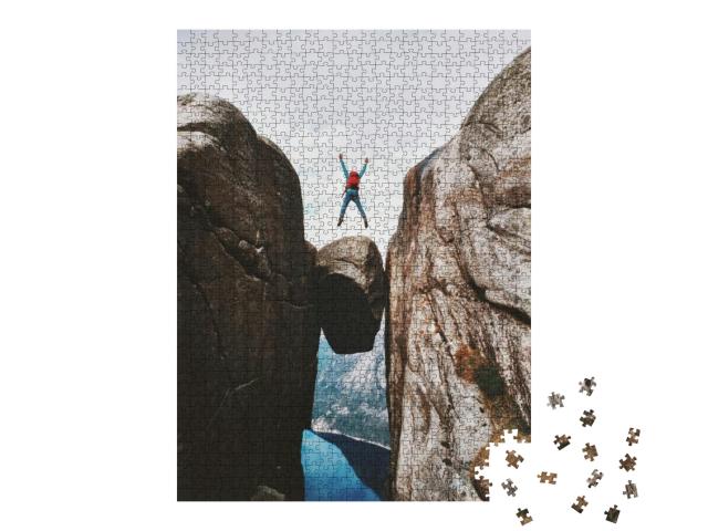 Man Jumping Over Kjeragbolten Travel in Norway Kjerag Mou... Jigsaw Puzzle with 1000 pieces