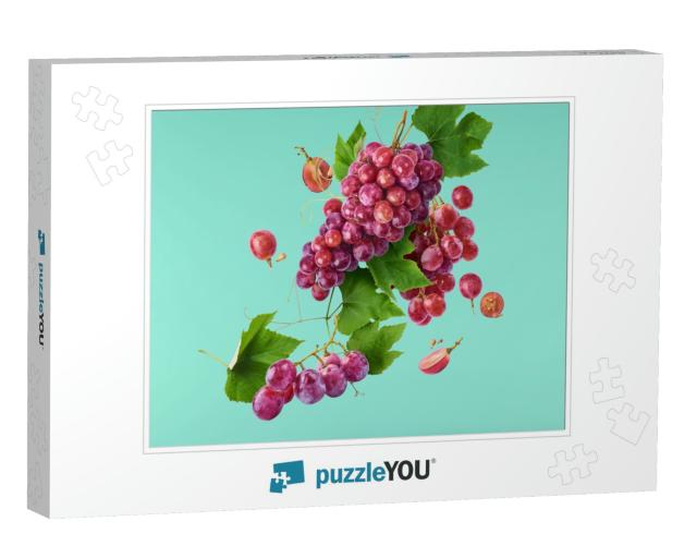 Fresh Ripe Grapes with Leaves Falling in the Air Isolated... Jigsaw Puzzle