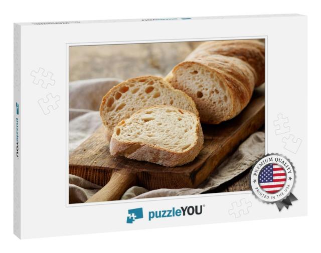 Freshly Baked Ciabatta Bread on Wooden Cutting Board... Jigsaw Puzzle