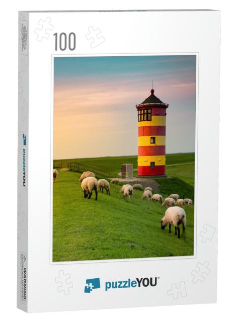 A Beautiful Lighthouse on the East Frisian Coast... Jigsaw Puzzle with 100 pieces