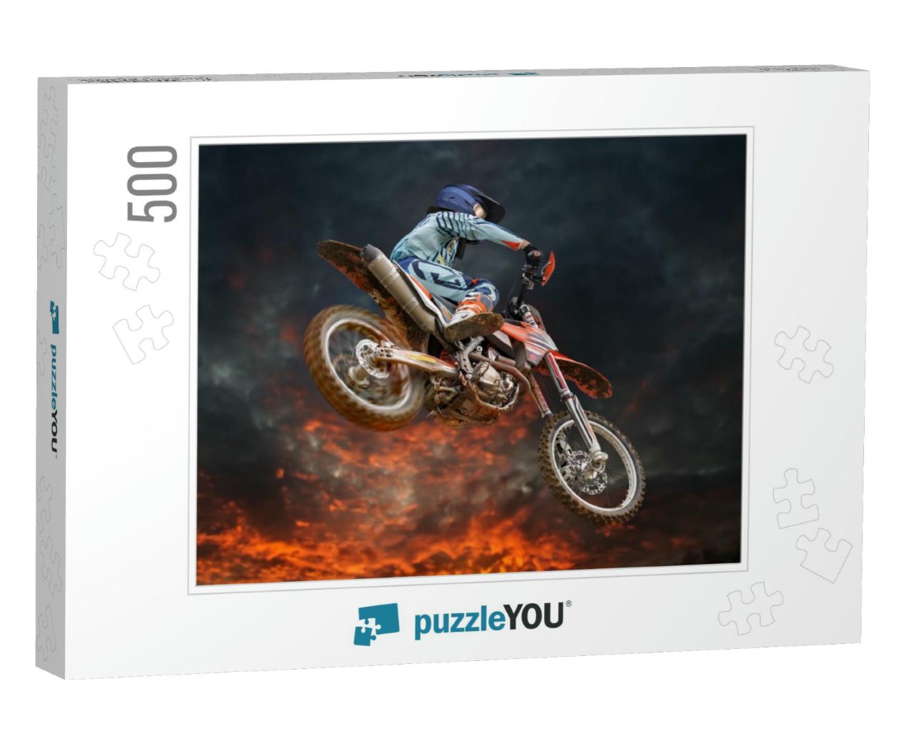 Jumping Motocross Rider with Firestorm in the Background... Jigsaw Puzzle with 500 pieces