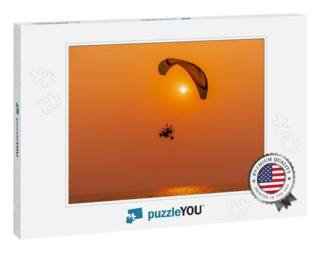 Silhouette of the Sport Paramotor Control Flying Through... Jigsaw Puzzle