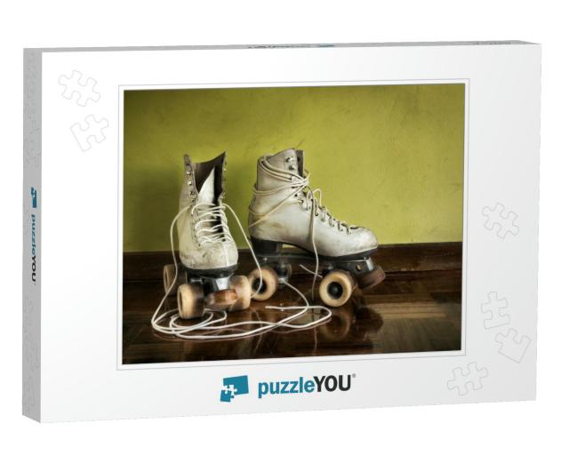 Old Worn Roller Skates with Big Shoe-Laces on a Yellow Wa... Jigsaw Puzzle