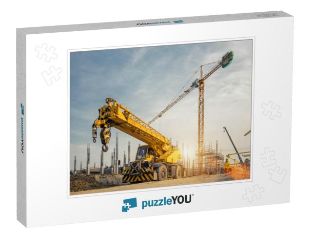 Mobile Crane on a Road & Tower Crane in Construction Site... Jigsaw Puzzle