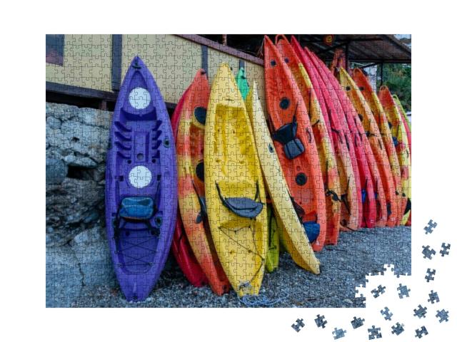 Many Multi-Colored Boats, Kayaks & Canoes, Are Moored At... Jigsaw Puzzle with 1000 pieces