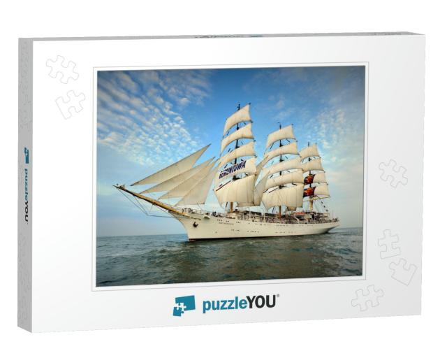 Tall Ship Under Sail with the Shore in the Background... Jigsaw Puzzle
