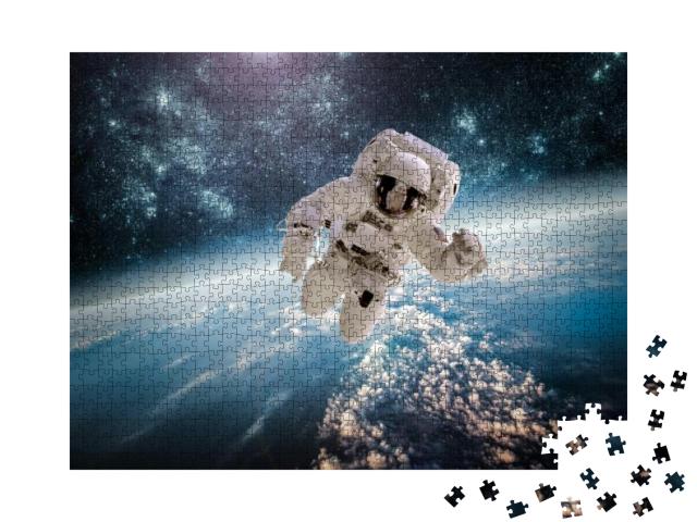 Astronaut in Outer Space Against the Backdrop of the Plan... Jigsaw Puzzle with 1000 pieces