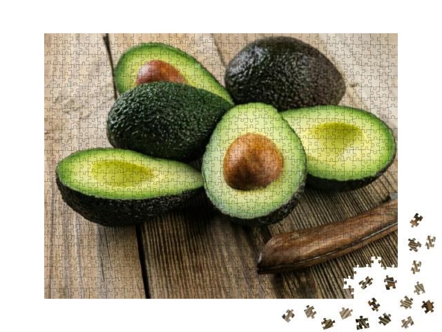 Fresh Sliced Avocado on Wooden Table. Vegetarian Food Con... Jigsaw Puzzle with 1000 pieces