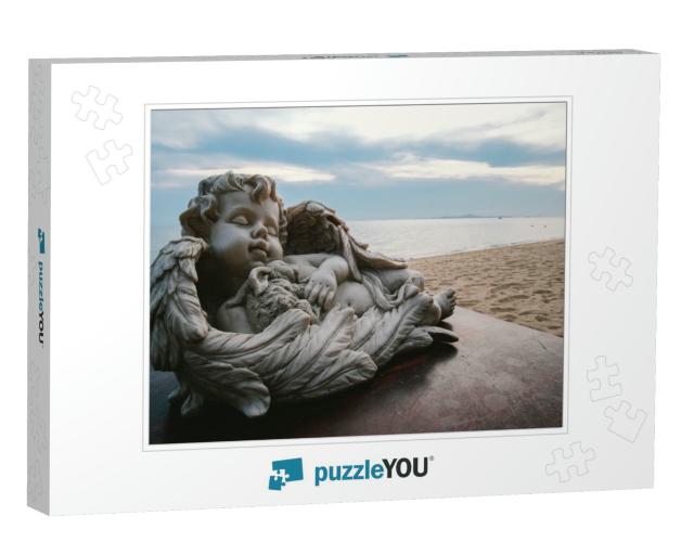 Baby Angel Statue Decorated on the Table by the Beach... Jigsaw Puzzle