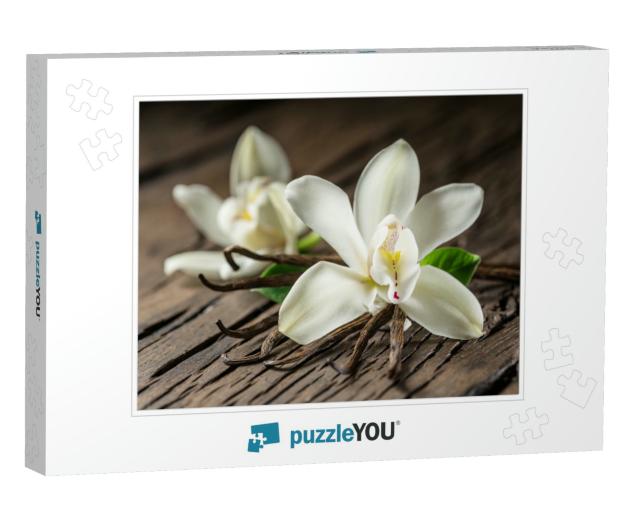 Dried Vanilla Sticks & Vanilla Orchid on Wooden Table. Cl... Jigsaw Puzzle