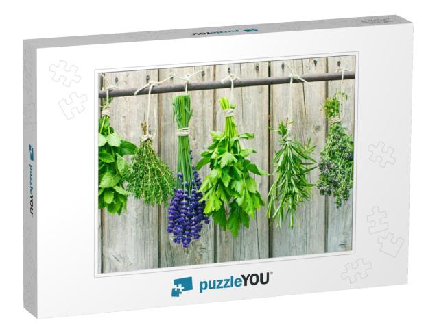 Various Fresh Herbs Hanging in Bundle on a Rod to Dry... Jigsaw Puzzle