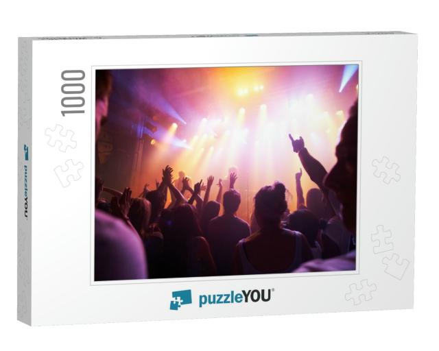 Rocking Out. Rear View of a Crowd Cheering At a Concert-... Jigsaw Puzzle with 1000 pieces