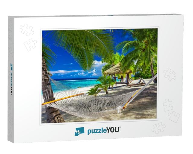 Hammock Between Palm Trees on a Vibrant Tropical Beach of... Jigsaw Puzzle